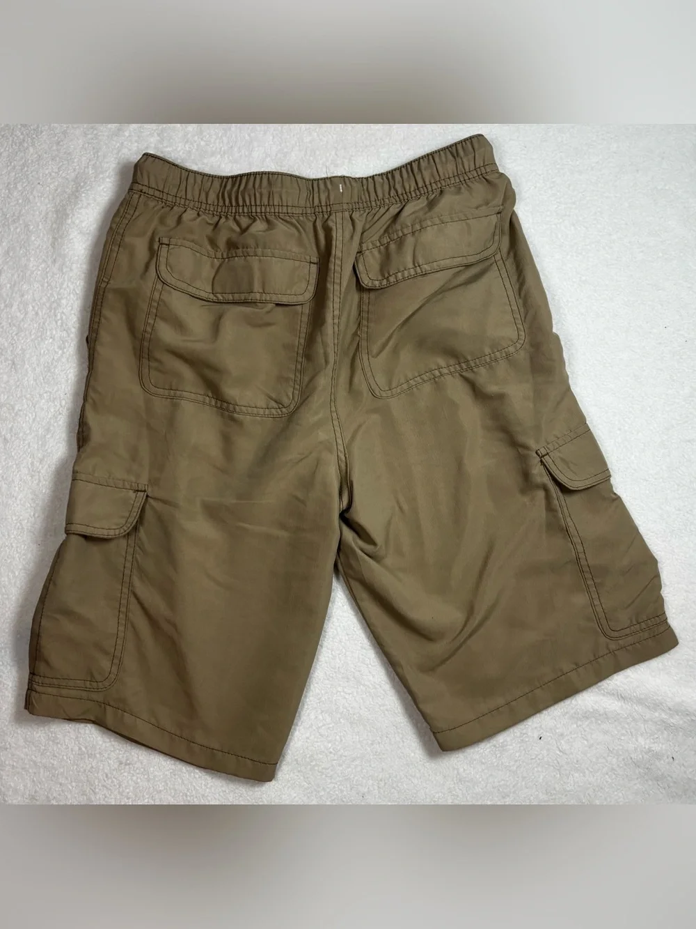 Plugg cargo Boy shorts with elastic waist, and multiple flap pockets